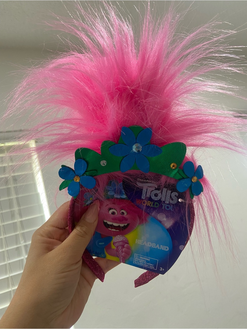Trolls Pink Fuzzy Headband with Blue & Green Flower Accents